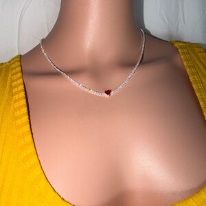 Elegant Silver Necklace with Red Heart Pendant